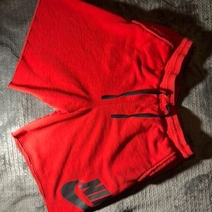Red Nike shorts
